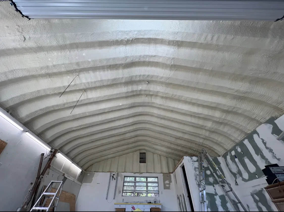 Spray polyurethane foam applied to the underside of a metal roof deck in Egg Harbor